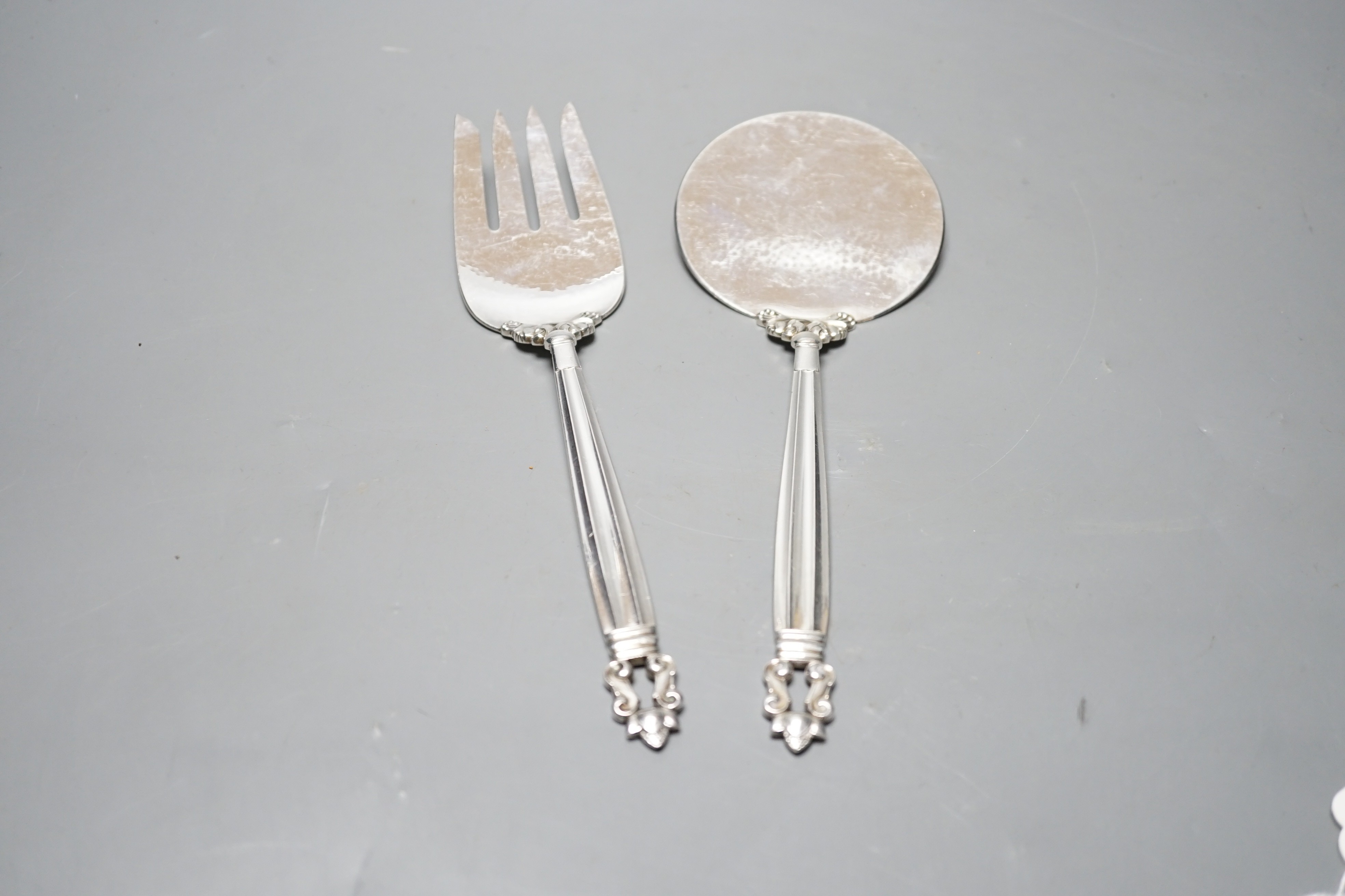 A boxed pair of Georg Jensen silver acorn pattern servers, London, import marks for 1967, 22.8cm, 6.2oz.